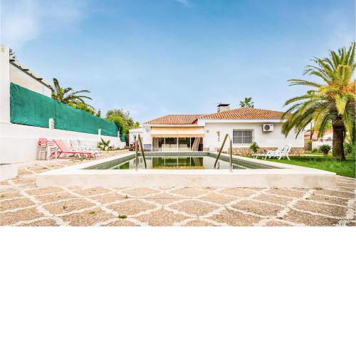 Stunning home in Valencina de la Concep with Outdoor swimming pool, WiFi and 3 Bedrooms