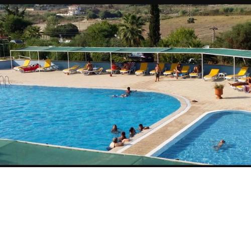 Summer Villa with pools, beach area, free sun loungers and free car park