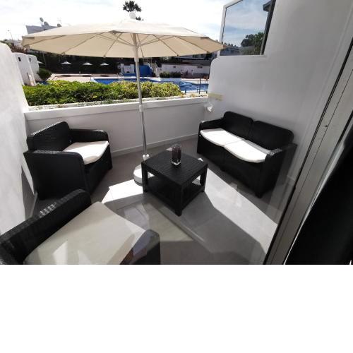 Sunny Apt with terrace coastal area South Arona