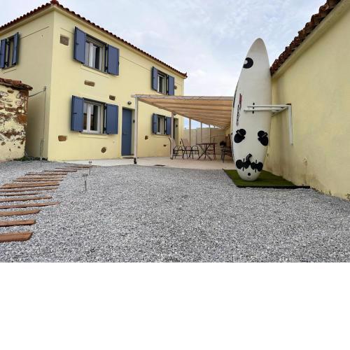 Surf-themed stone house at Kalliopi 2