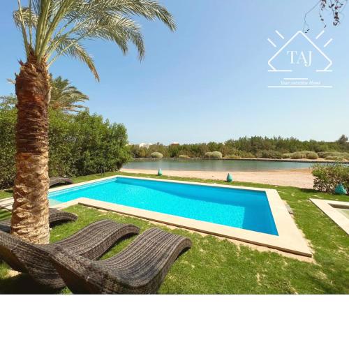 Taj Home, Chic 3BR Villa. Heated Pool & Lagoon View. 2minutes to Marina.