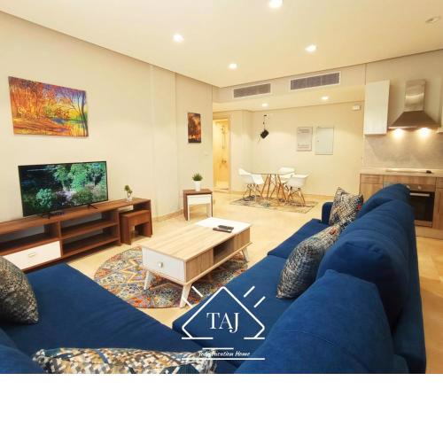 Taj Home ,cozy mangroovy 2BR apartment..pool&Beach access