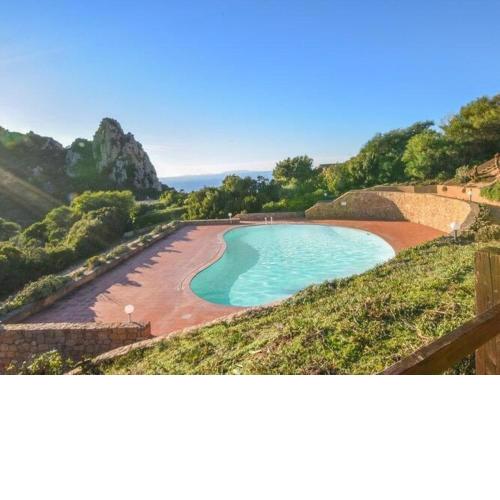 Terraced house with communal pool Costa Paradiso