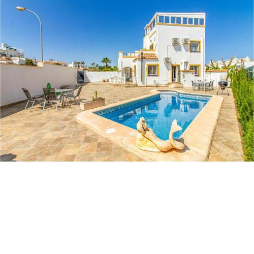 Three-Bedroom Holiday home Orihuela Costa with a Fireplace 04