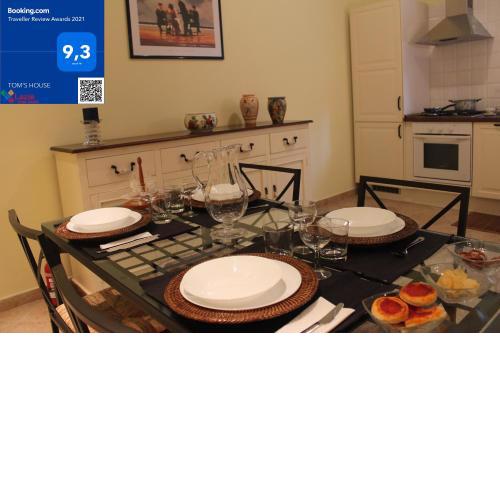 TOM'S HOUSE