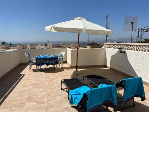 Top-floor apartment with 65 m2 sun terrace