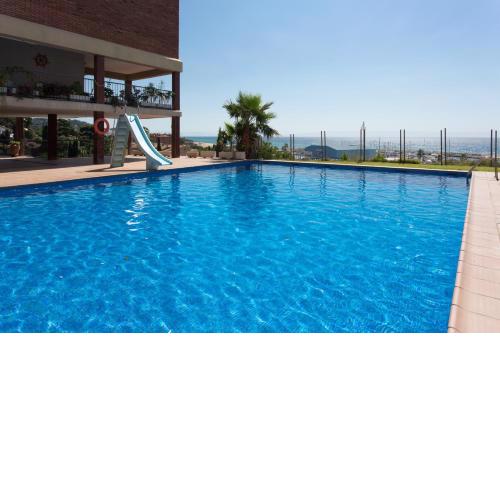 Tranquilidad junto al mar con piscina