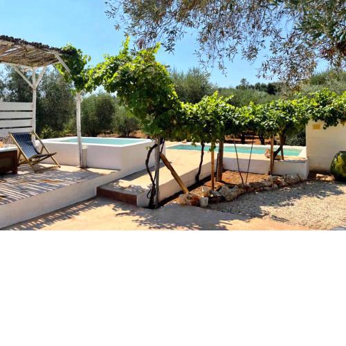 Trullo Solleone con piscine by Wonderful Italy