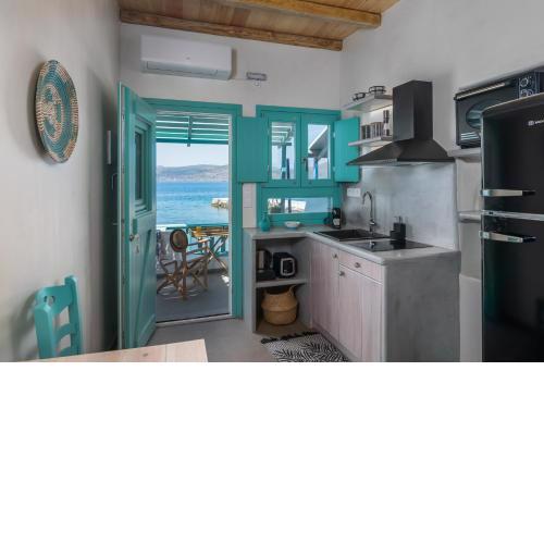 Turquoise Boathouse in Klima II