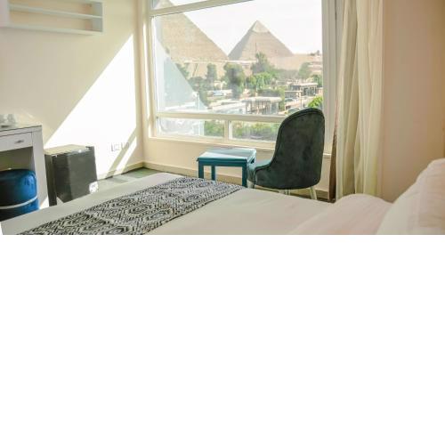 Turquoise Pyramids & Grand Egyptian museum view Hotel