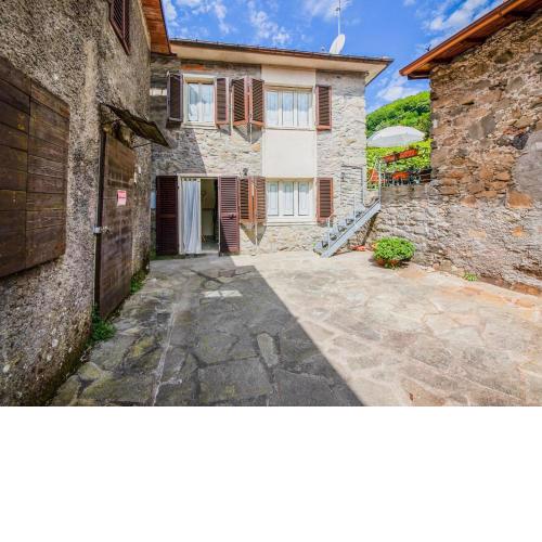 Tuscan house built on the hill of a small mountain village