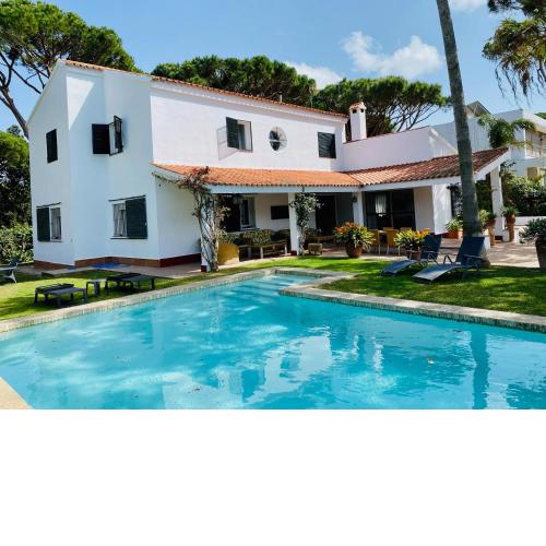 Villa América con Piscina en Urbanización Roche Conil Cádiz Andalucía España