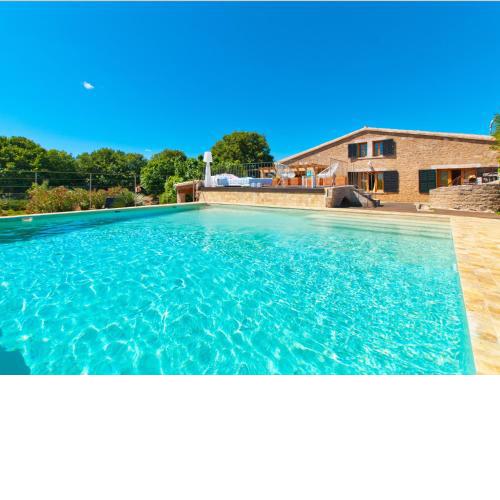 Villa Barcares Petit, piscina, jardines junto a playa en Alcudia