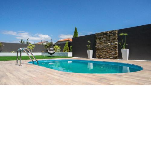 Villa con piscina a pie de playa