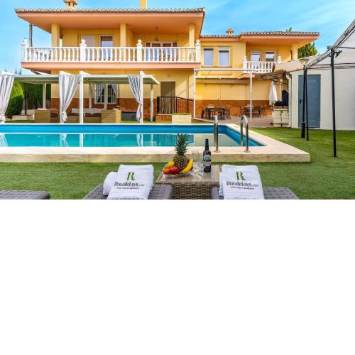 Villa de la Acacia Gójar by Ruralidays