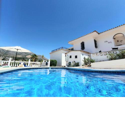 Villa Fuengirola. Large Andalusian Style Villa with Pool, large sunny terraces and private garden