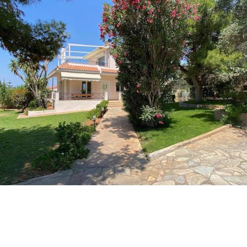 Villa Reina on the hill of Vouliagmeni