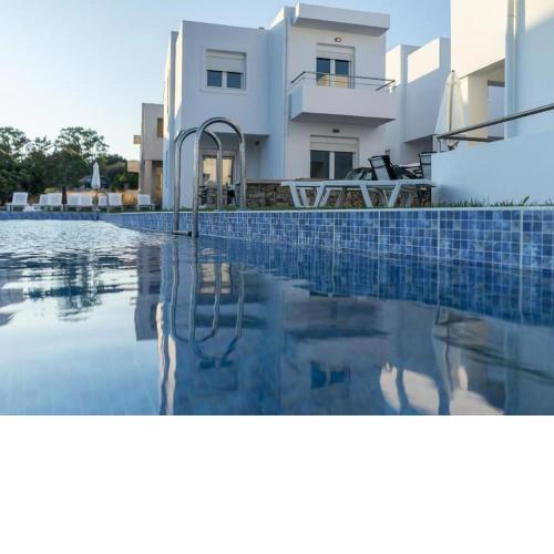 Welcoming Holiday Home in Gennadi with Shared Swimming Pool