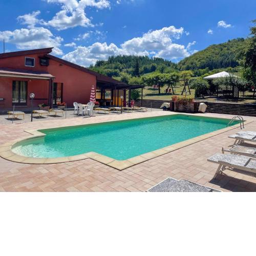 Welcoming holiday home in Urbania with shared pool