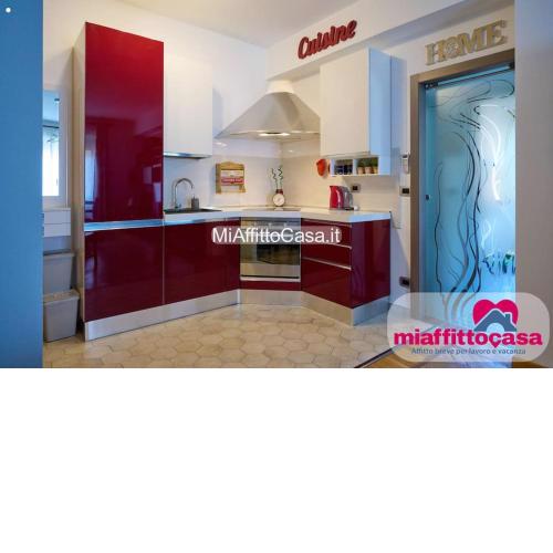 Wissam's Red Kitchen Apartment